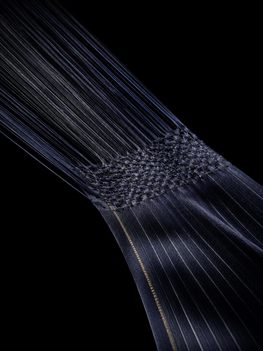 Fine worsted threads drawn true at the European mills